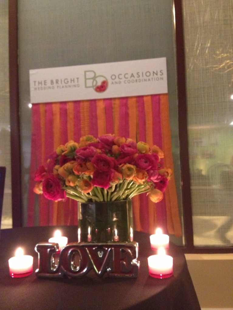 Bright Occasions - DIY streamer backdrop.  Flowers by Edge Floral.