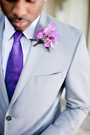 Gray Suit and Radiant Orchid Boutonniere via Southern Weddings 