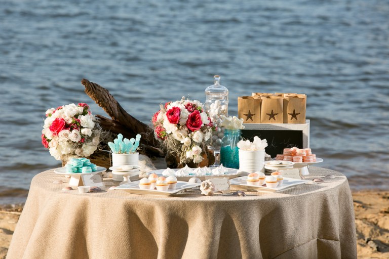 In lieu of favors that guests will leave behind, opt for a mini dessert table with take-home bags for guests.    Photo Credit: Kate Fine Art Photography, Flower Follies, Allison Barnhill Design