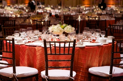 A pintuck linen is very classic for weddings, try a bold color a look that is fresh and modern. http://www.theweddingspecialists.net/fall-wedding-tables.html