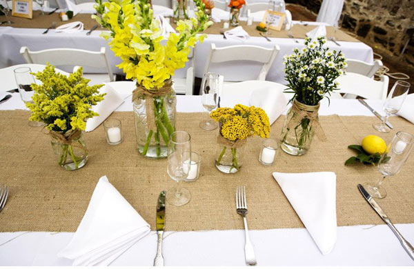 A burlap runner is a great idea to add some interest for wedding tables and can also be done as a DIY project. http://ruffledblog.com/burlap-and-vintage-tablescapes/